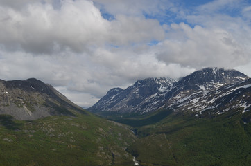 Fototapeta na wymiar River through valley in Norwegian mountains, northern Scandes