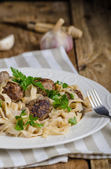 Homemade tagliatelle with meat balls