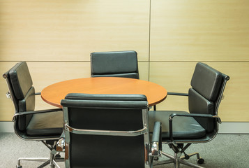 wood round table for meeting in manager room background