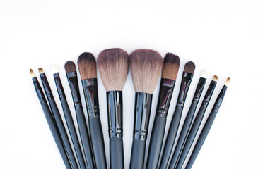makeup brushes set for professional on blackboard background