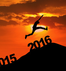 Man jumping over 2016 number at hill