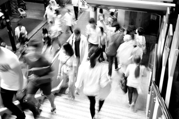 Moving blur people walking - black and white effect