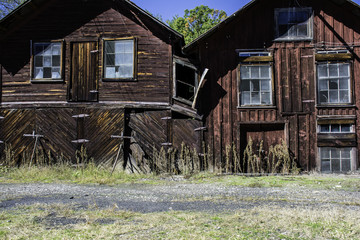 old wooden buildings at partially abandoned rail yard