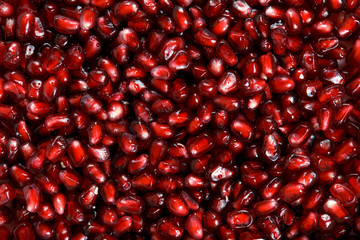 Close up Fresh Pomegranate fruit seeds. background