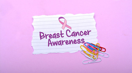 Breast Cancer Awareness written on Pink ground