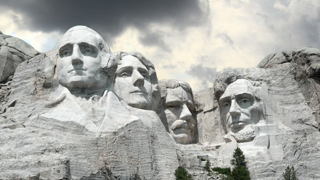 Mount Rushmore Timelapse 1. Mount Rushmore, tilt and zoom out with time lapse clouds behind it.
