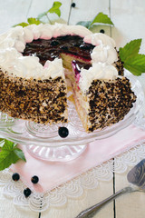 Sponge cake with whipped cream and jam