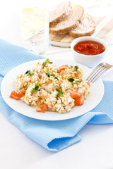 Breaded chicken breast with salad greens and oyster mushrooms