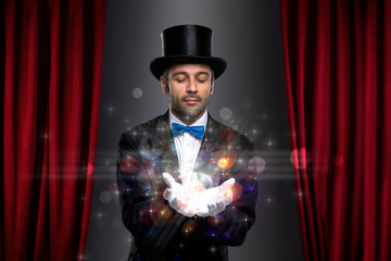 Magician with magic on palm