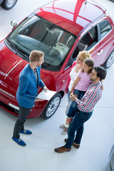 family with car dealer