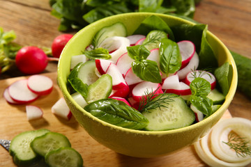 Fresh vegetable salad on table close up