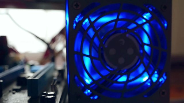 Inside the computer motherboard and hard disk in slowmotion with
