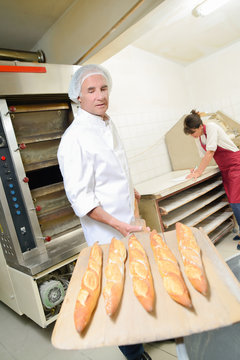 Fresh bread coming out of the oven