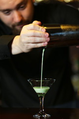 Bartender making cocktail