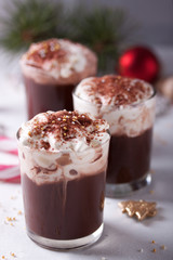 Christmas hot chocolate drink with whipped cream.