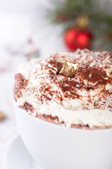 Christmas hot chocolate drink with whipped cream.