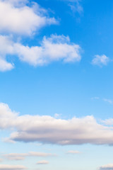 white clouds in blue sky in autumn day