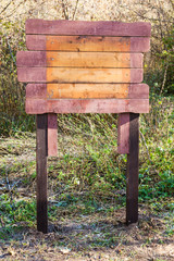 empty wooden outdoor pointer in urban park