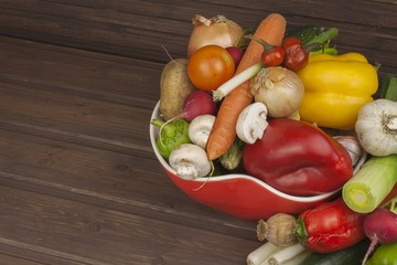 Various types of vegetables on an old wooden table. The concept of diet food. Food for obese patients. Autumn harvest vegetables. Growing fresh home-grown vegetables
