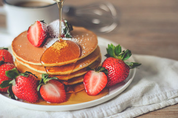 Pancake with Strawberries and Syrup