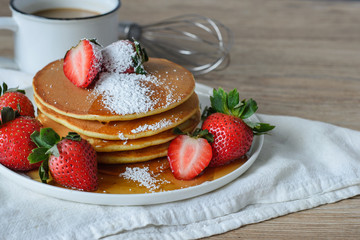 Pancake with Strawberries and Syrup