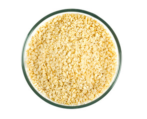 sesame seeds in a bowl isolated on white
