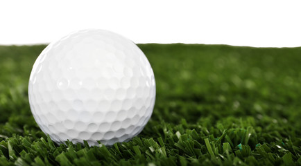 Golf set on grass isolated on white