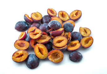 Frozen plum without pit isolated on white background