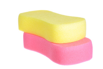 red and yellow bathing sponge over white background