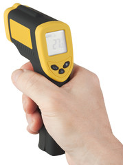 Infrared non-contact digital thermometer with laser sight in man hand. Object isolated on white background without shadows