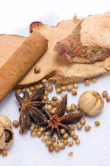 Star anise, cinnamon, peppercorns, cinnamon sticks and another spices.
