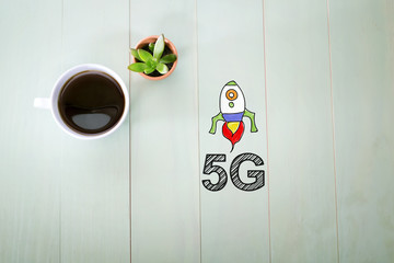 5G concept with a cup of coffee