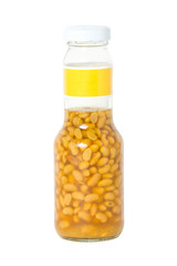 Salted soy bean in glasses bottle isolated on white.