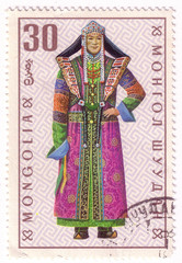 Mongolia - circa 1969: A post stamp printed in the Mongolian shows image of clothes, series Mongolian national clothes, circa 1969.
