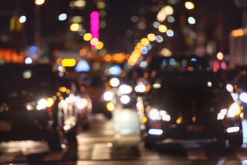 Fototapeta na wymiar Rush hour car traffic on the night street in New York City