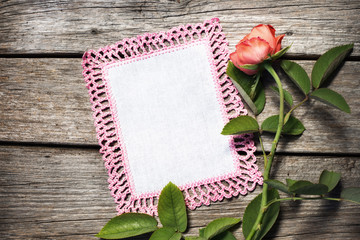 rose on wooden board
