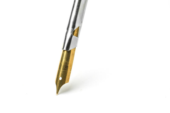 Gold color nib pen isolated on white