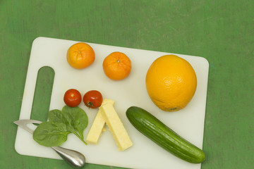Organic Fruit and Vegetables with Cheese on Display