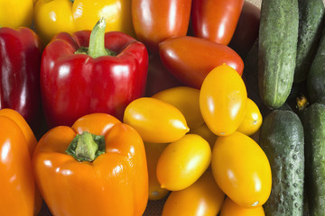Assorted ripe multicolor vegetables on a burlap canvas close up