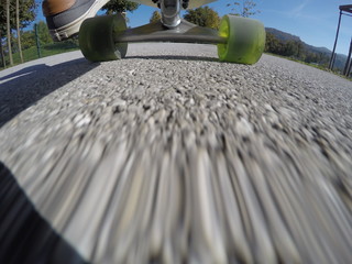 Fototapeta premium Riding longboard at the city park