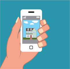 Smartphone in hand with house picture Vector