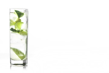 Fresh cocktail with lime slices isolated on white background