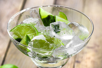 Fresh cocktail with lime slices