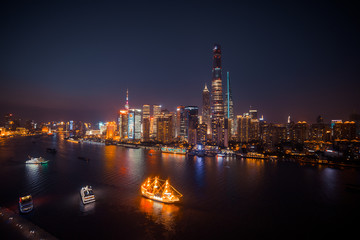 Panorama view of Shanghai city scape at night time. Aerial 