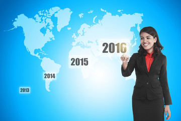 Fototapeta na wymiar Business person touching 2016 year button