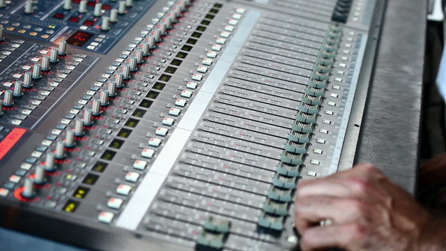 Hands on professional audio mixer