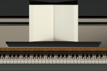 Piano with empty music notebook