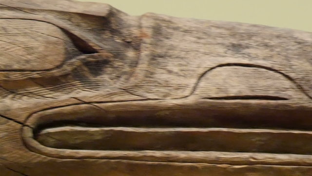 Huge wooden logs carved into a decoration. It is like a table or home decor with a design