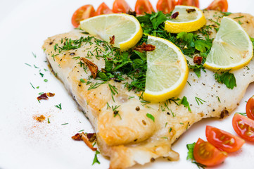 grilled fish with vegetables and cream sauce
