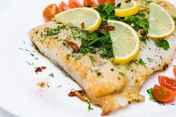 grilled fish with vegetables and cream sauce